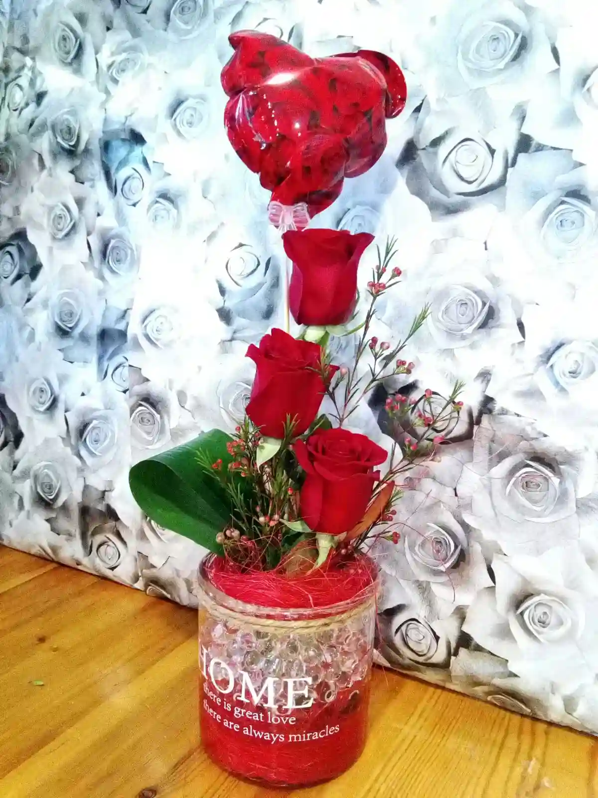 Tres rosas rojas
